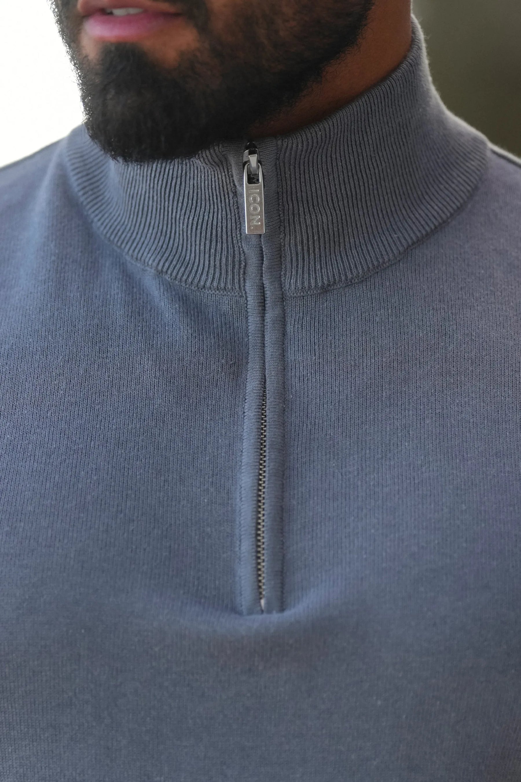 THE SANTONI HALF ZIP SWEATER
