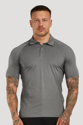 THE MUSCLE BUTTON POLO